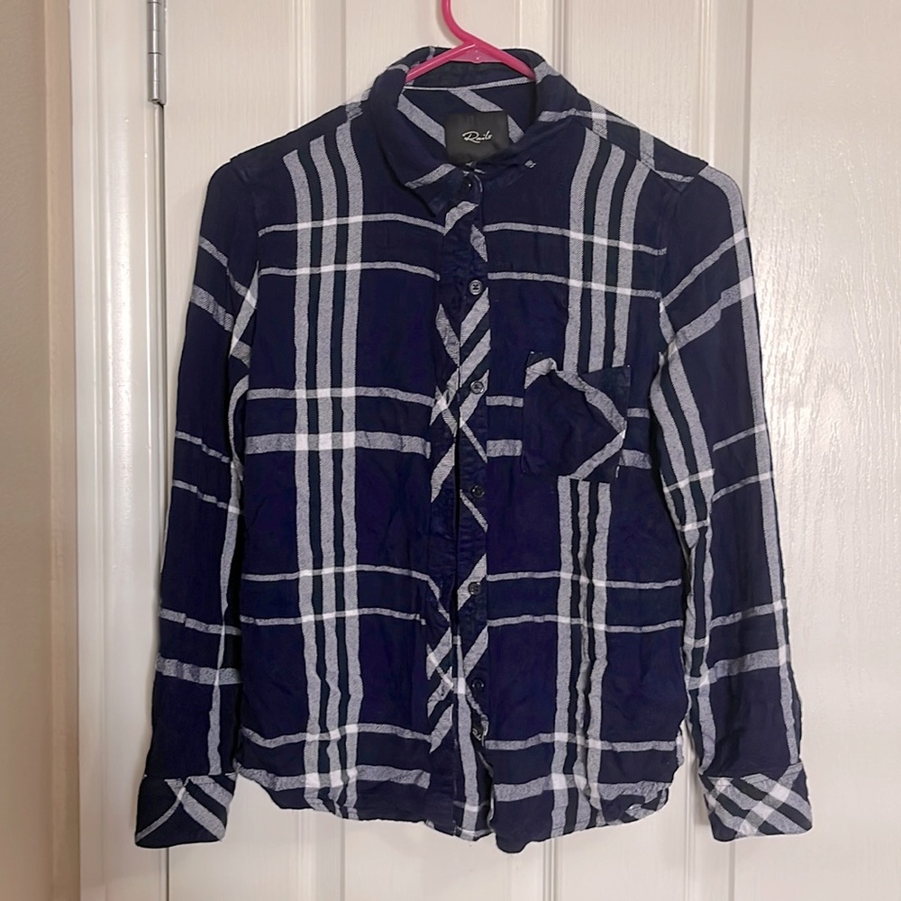 Blue plaid shirt.